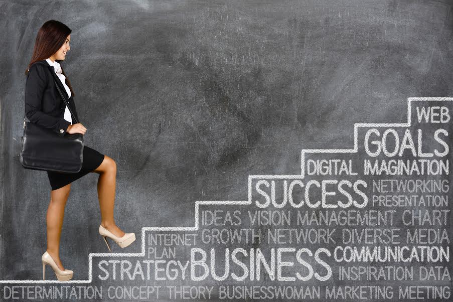 A woman walking up a staircase of business success!